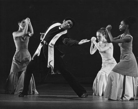 Alvin Ailey American Dance Theater's Kelvin Rotardier in center with company in Alvin Ailey's 'Mary Lous Mass.' Photo by Rosemary Winckley