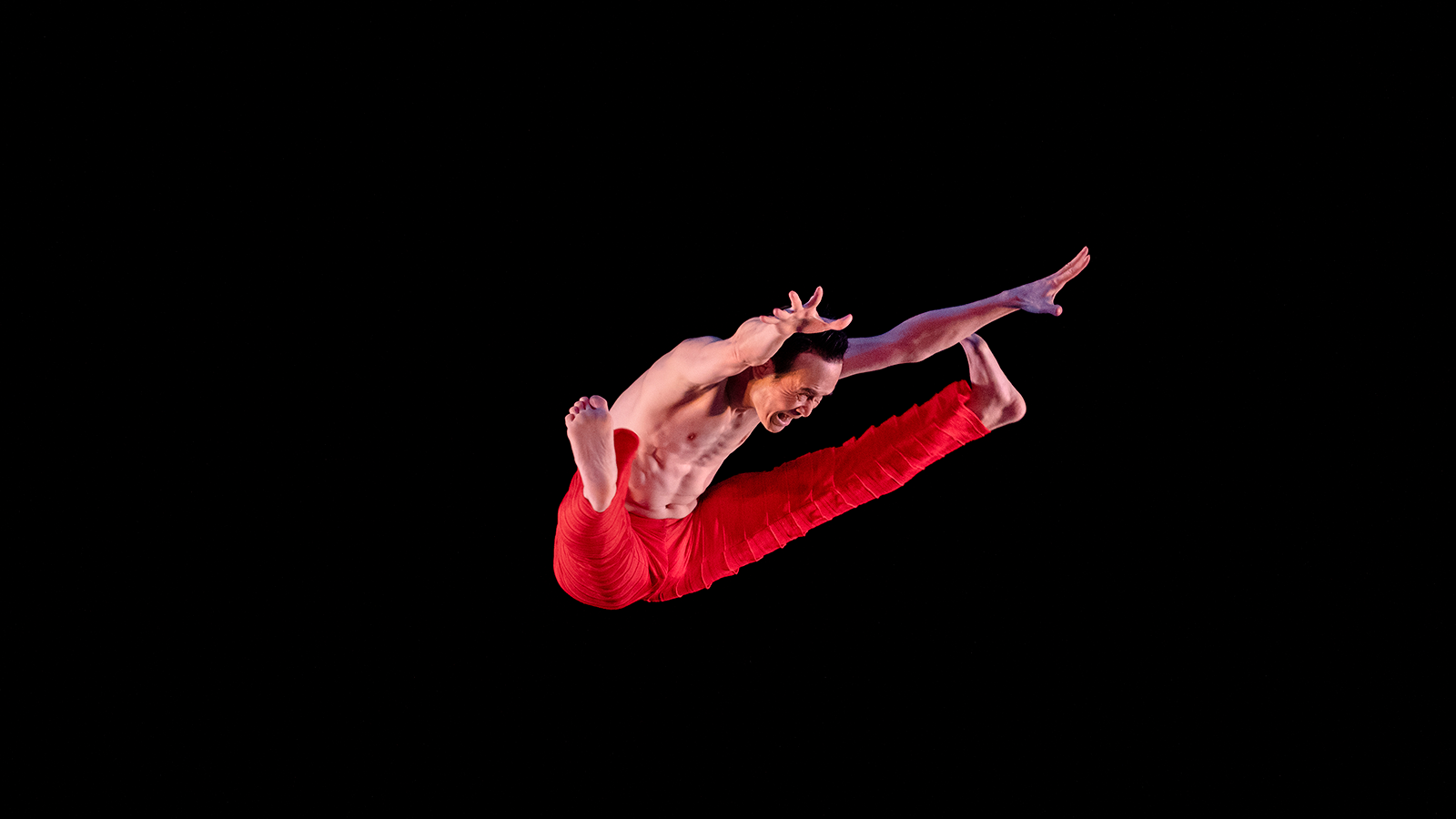 Alvin Ailey American Dance Theater's Kanji Segawa in Robert Battle's Takademe. Photo by Paul Kolnik